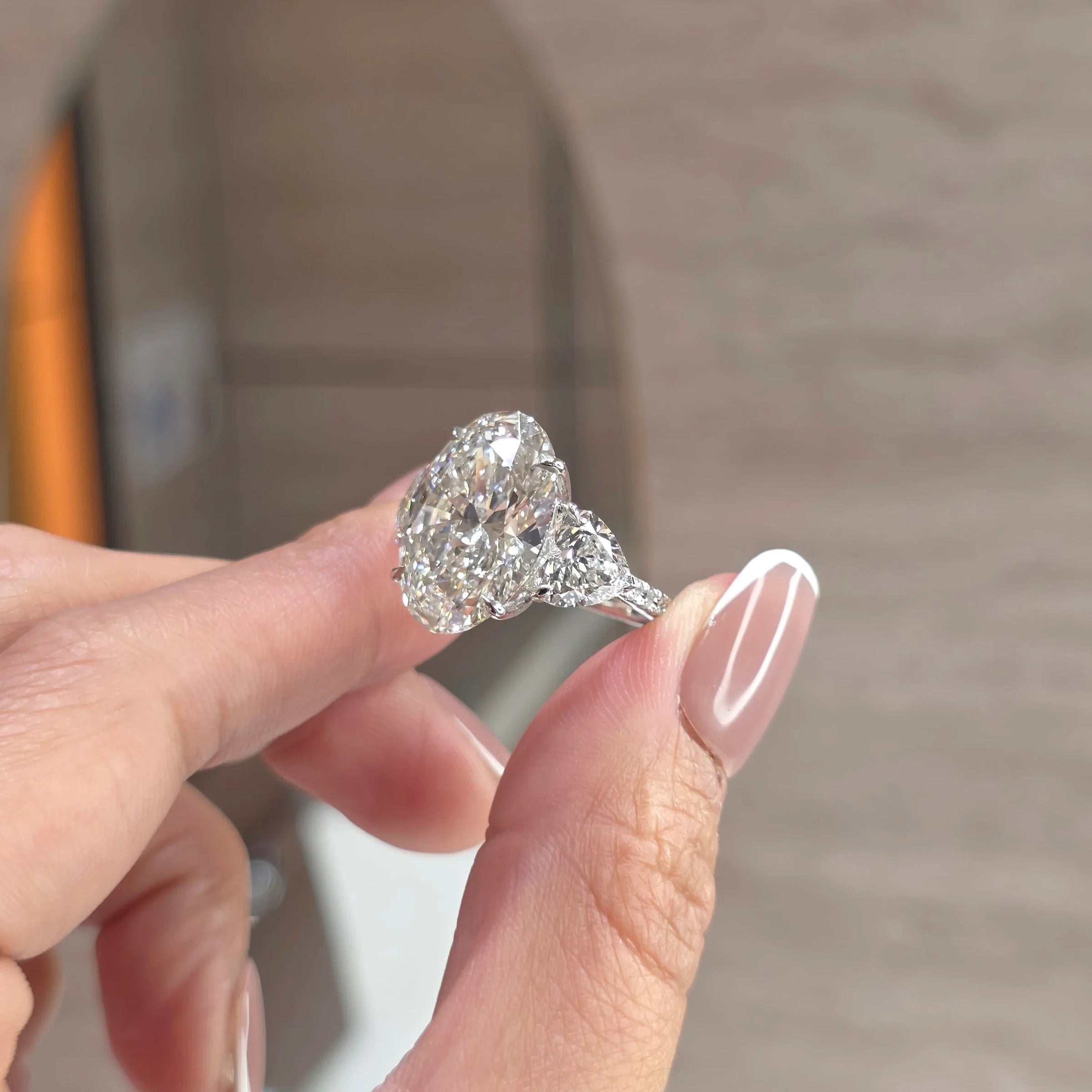 Love Struck - 10 Carat Oval Lab-Grown Diamond Solitaire Trilogy Ring with 2 Carat Heart Side Diamonds & Pavé Band – 18K Gold