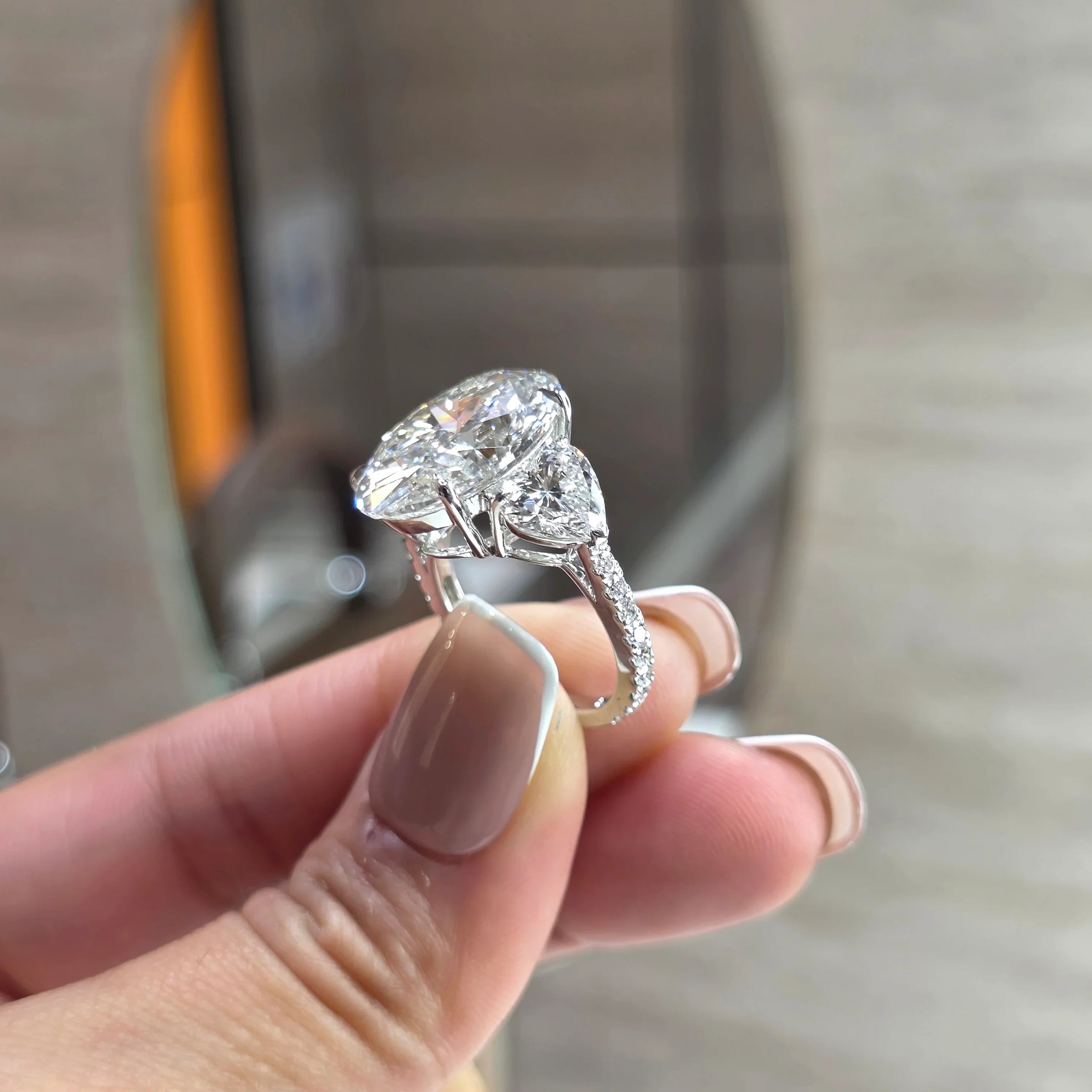 Love Struck - 10 Carat Oval Lab-Grown Diamond Solitaire Trilogy Ring with 2 Carat Heart Side Diamonds & Pavé Band – 18K Gold