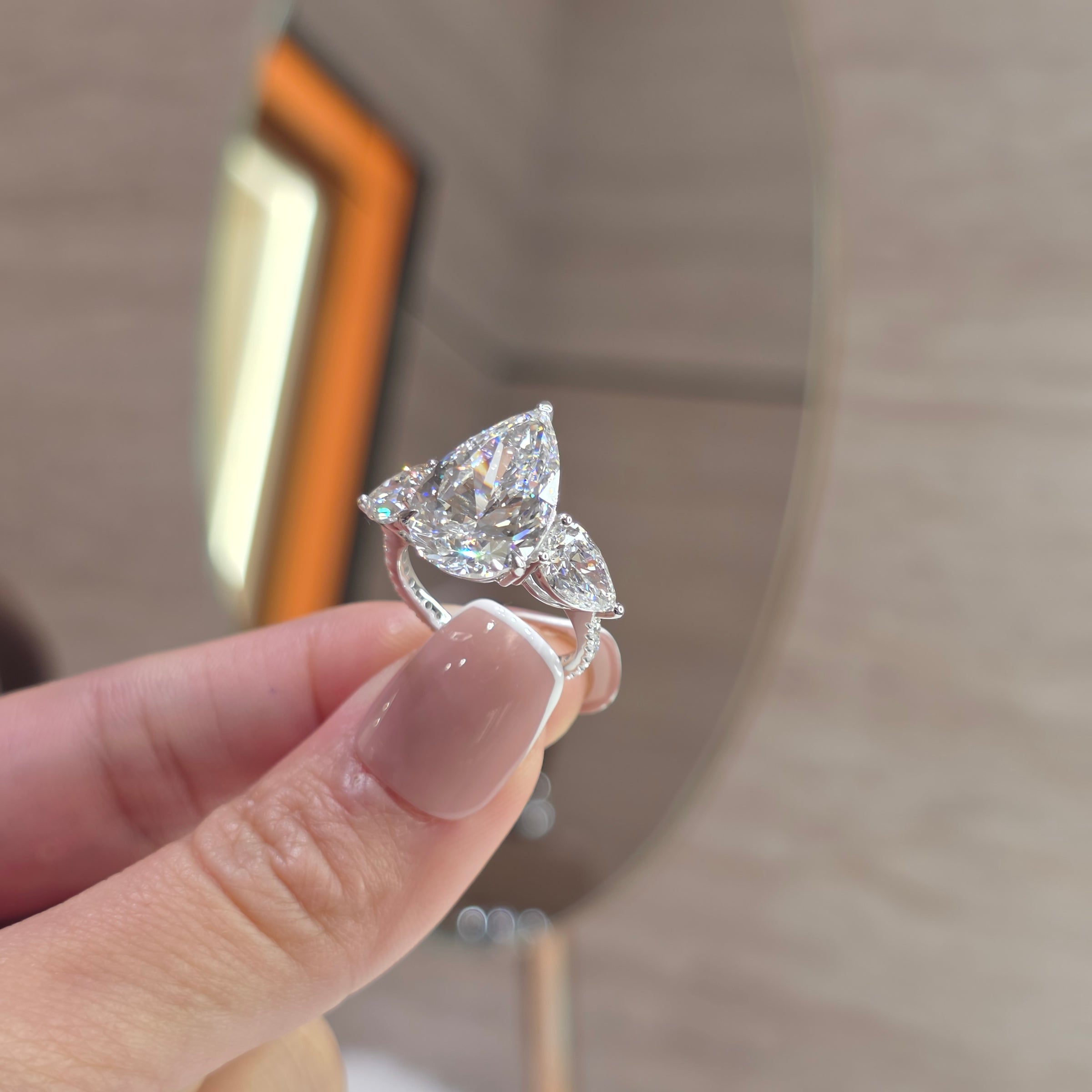 7 Carat Pear Lab-Grown Diamond Trilogy Ring with 2 Carat Pear Side Diamonds & Pavé Band – 18K Gold