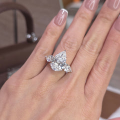7 Carat Pear Lab-Grown Diamond Trilogy Ring with 2 Carat Pear Side Diamonds & Pavé Band – 18K Gold