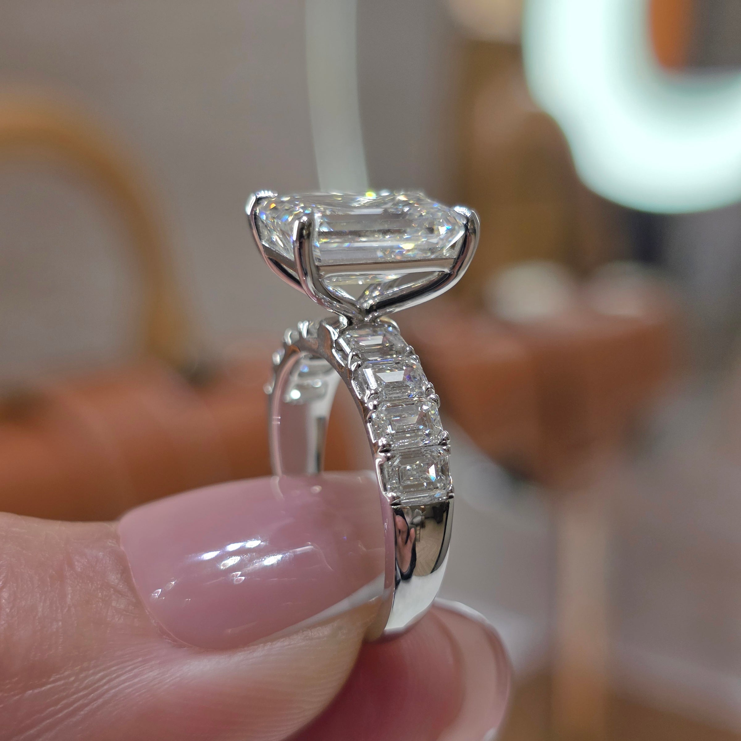 4 Carat Emerald Cut Lab Grown Diamond Solitaire Ring with Emerald Diamond Band in 18K Gold | Emerald Side Stones