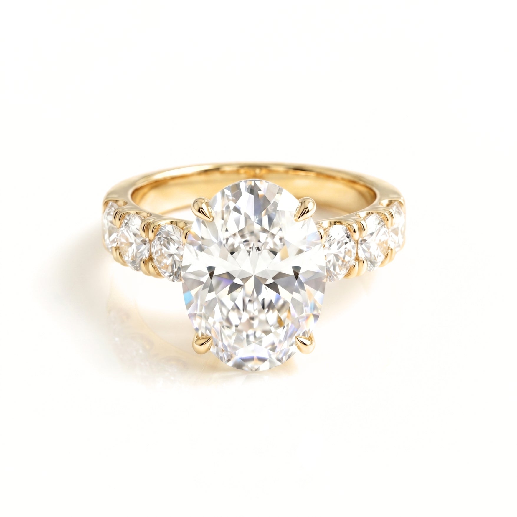 5 Carat Oval Lab Grown Diamond Ring with Oval Side Stones in 18K Gold