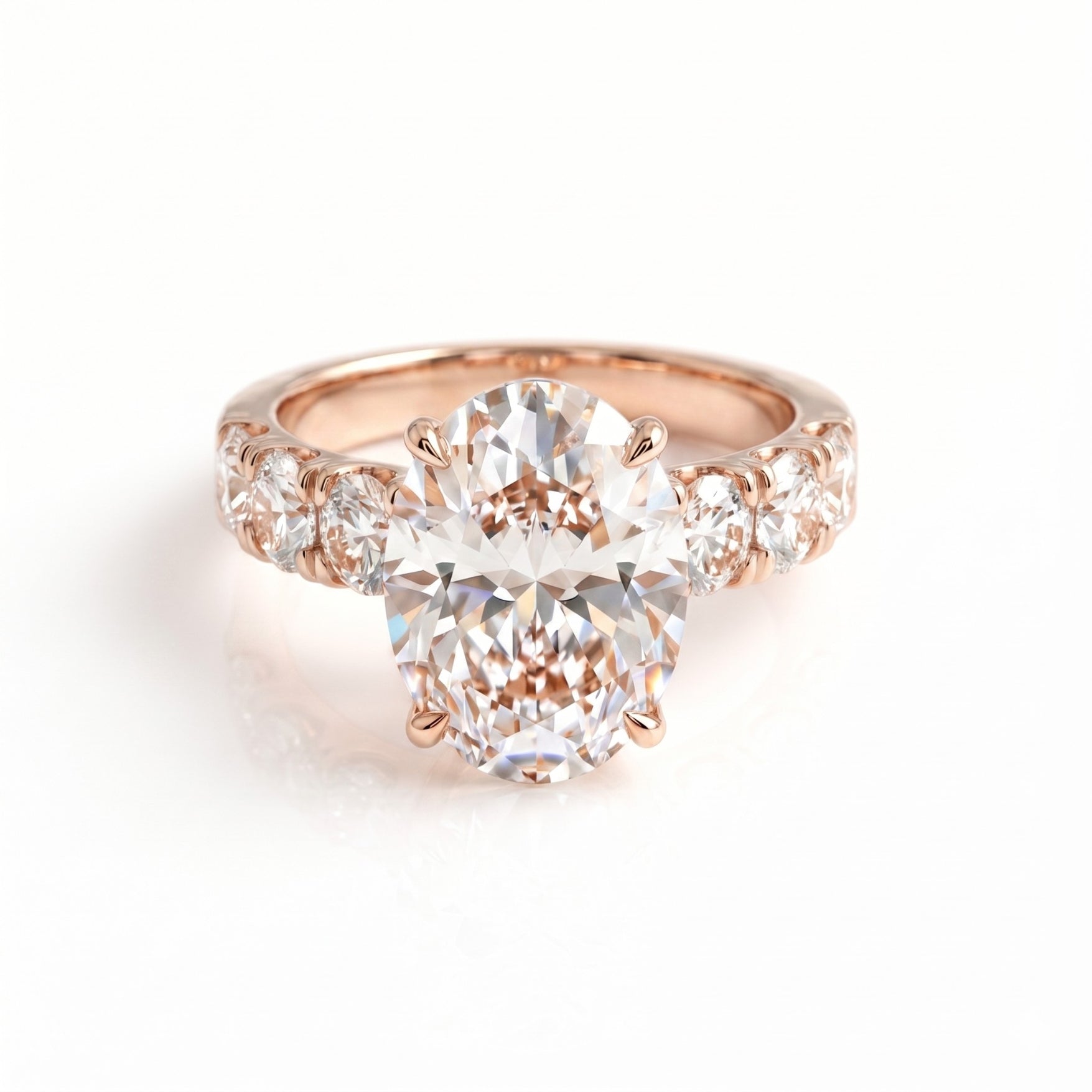 5 Carat Oval Lab Grown Diamond Ring with Oval Side Stones in 18K Gold