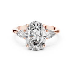 1–5 Carat Oval Cut Lab-Grown Diamond Solitaire Trilogy Ring in 18K Gold – Pear Side Stones