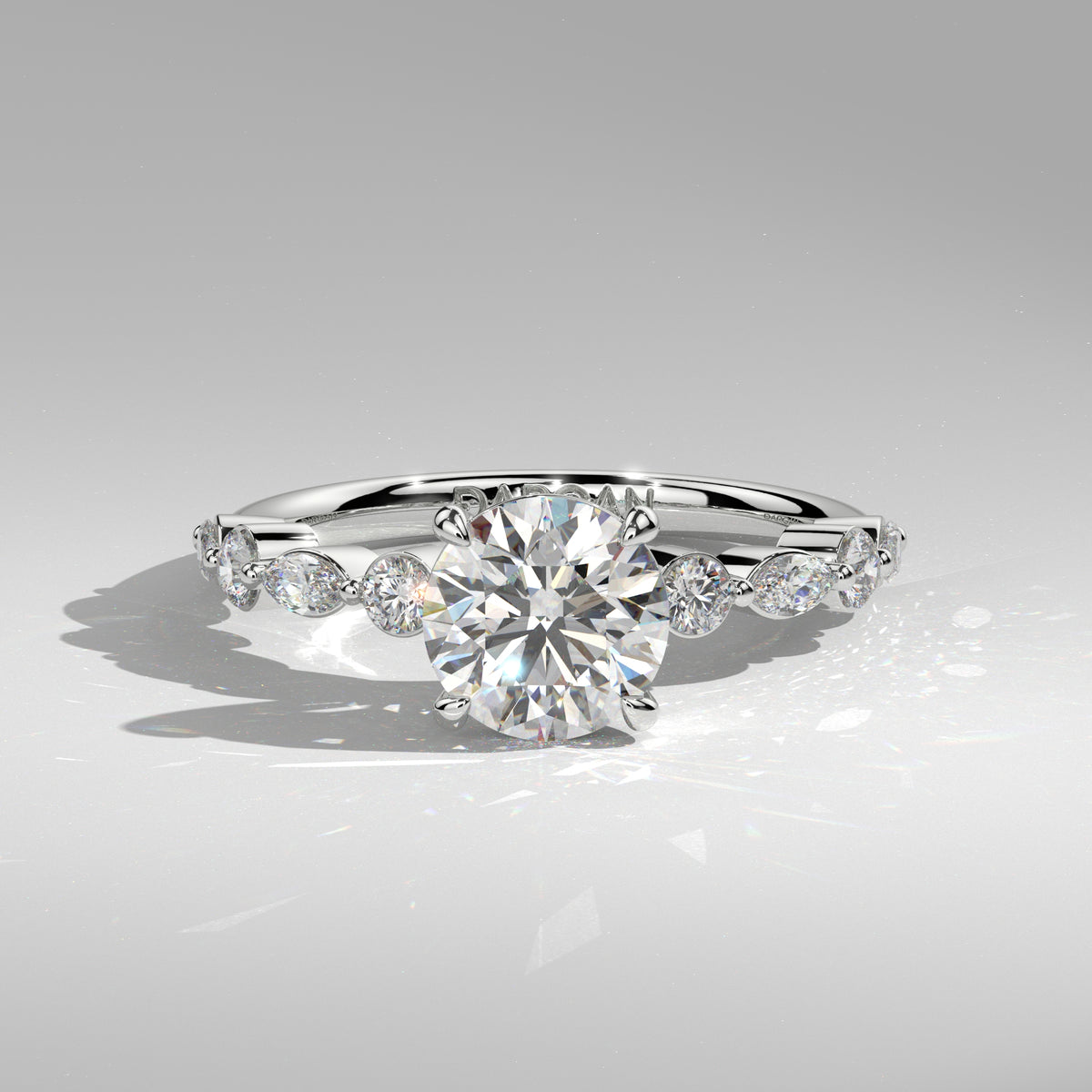 Orbis Round lab-grown diamond solitaire ring with marquise and round side stones in 18K white gold, front view