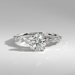 Orbis Round lab-grown diamond solitaire ring with marquise and round side stones in 18K white gold, front view