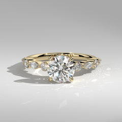 Orbis Round lab-grown diamond solitaire ring with marquise and round side stones in 18K yellow gold, front view