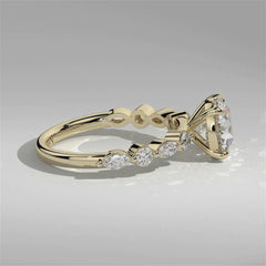 Video of Orbis Round lab-grown diamond solitaire ring with marquise and round side stones in 18K yellow gold, 360-degree view