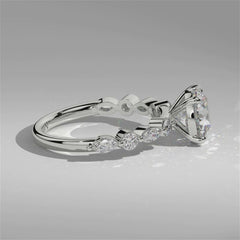 Video of Orbis Round lab-grown diamond solitaire ring with marquise and round side stones in 18K white gold, 360-degree view