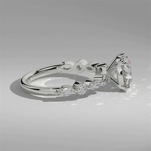 Video of Orbis Round lab-grown diamond solitaire ring with marquise and round side stones in 18K white gold, 360-degree view
