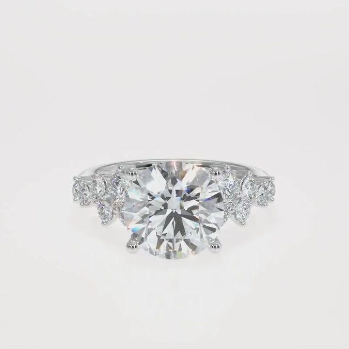 3.00 to 5.00 Carat Round Brilliant Lab-Grown Diamond Ring with Tapered Cluster Side Stones in 18K Gold
